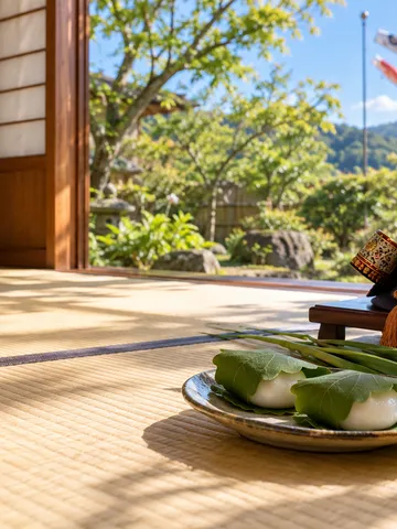 兜と柏餅、菖蒲を飾った端午の節句の和室